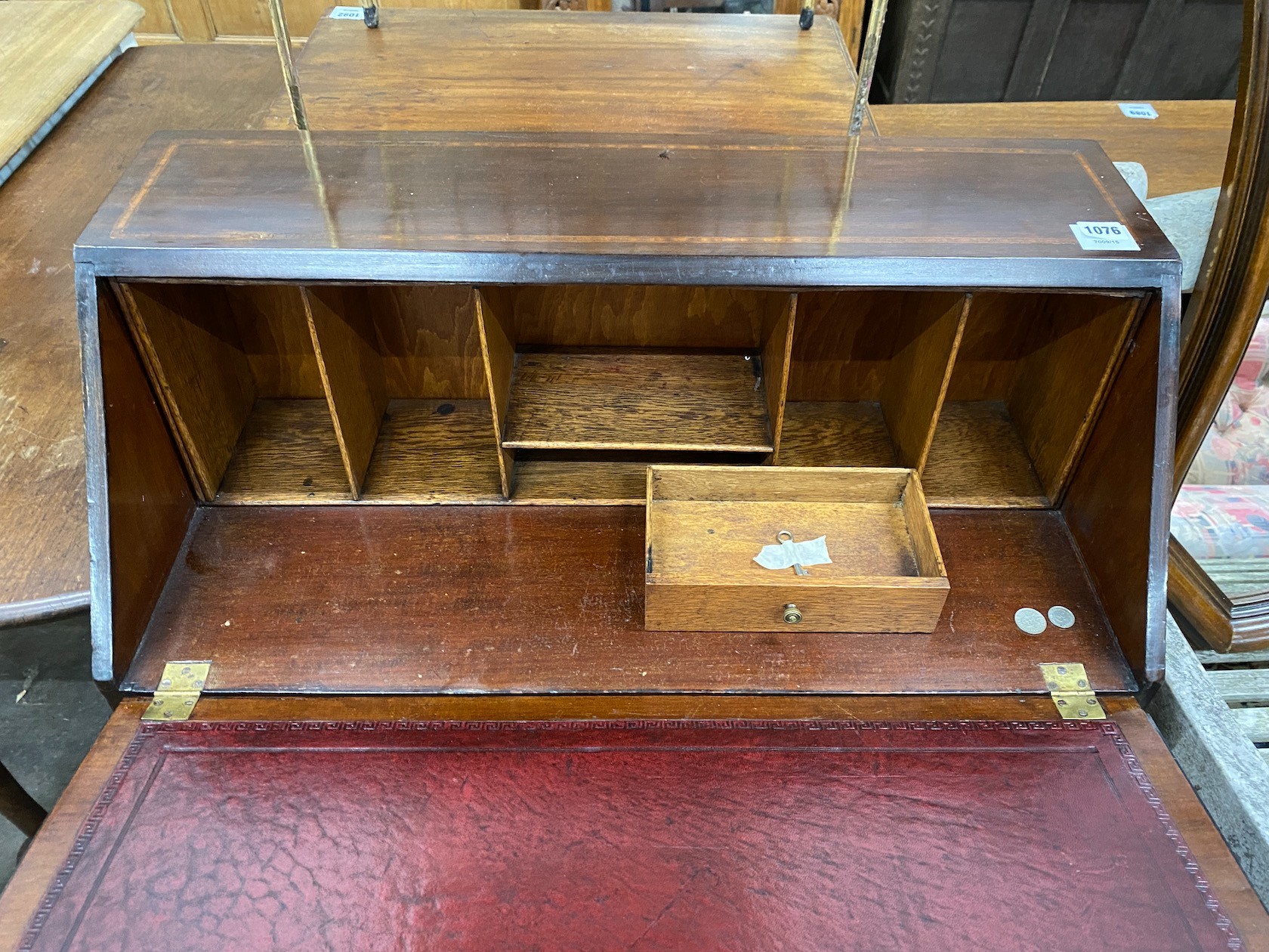 An Edwardian inlaid mahogany bureau, width 76cm